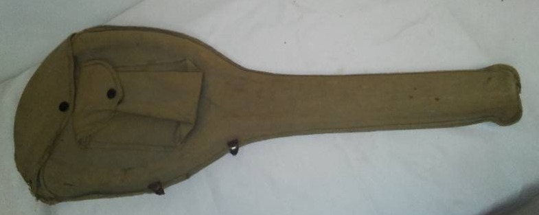 vintage tennis racket and canvas carrier