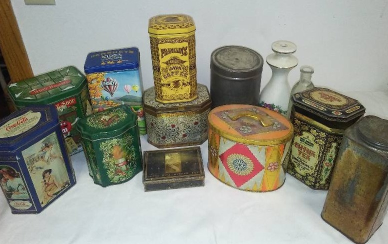 new and old tins