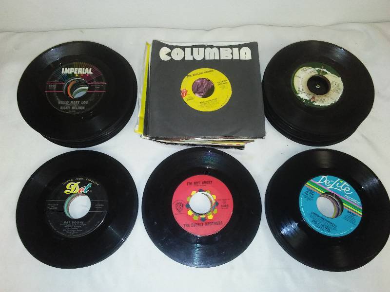 45 vinyl records 9 inches tall