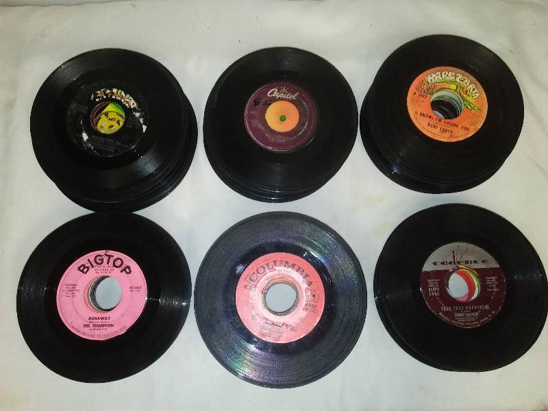 45 vinyl albums 10 inches tall