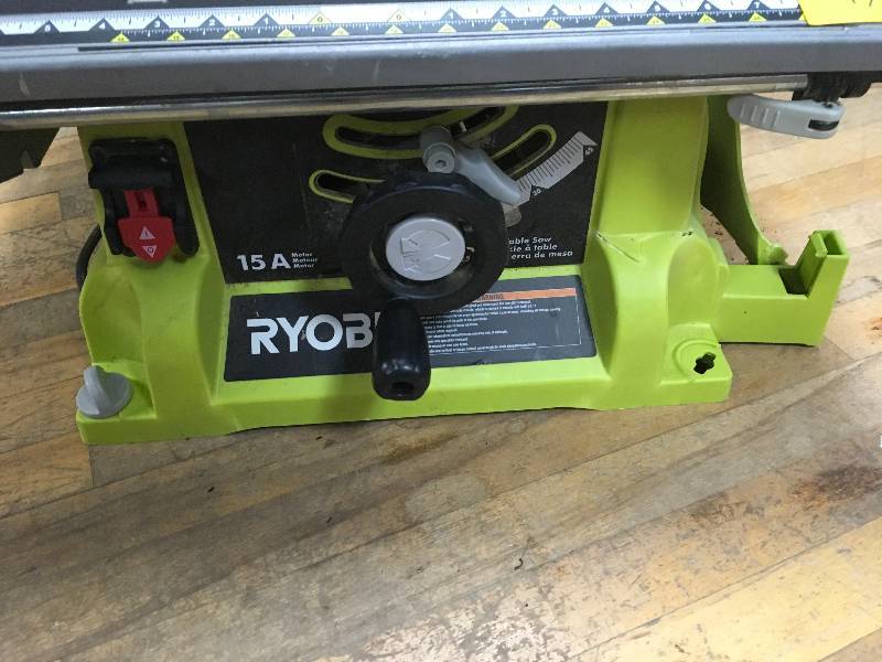 lot 11 image: Ryobi 10 in. 15 Amp Table Saw in working conditions missing parts please review the pictures