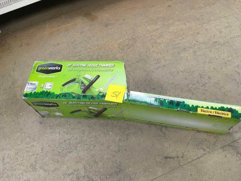 lot 51 image: GreenWorkers 22 in. 4 Amp Electric Hedge Trimmer in working conditions