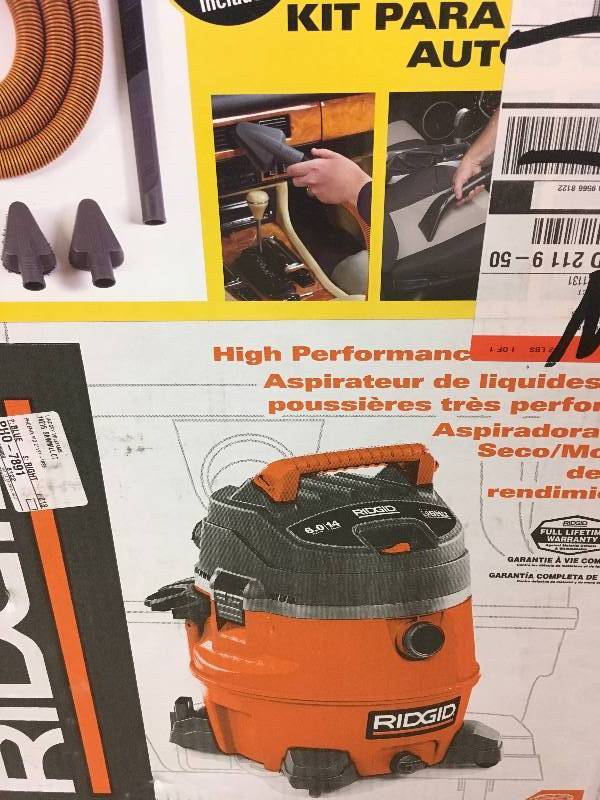 lot 52 image: Ridgid 14 gal. 6.0-Peak HP Wet Dry Vac with Auto Detail Kit in good working condition