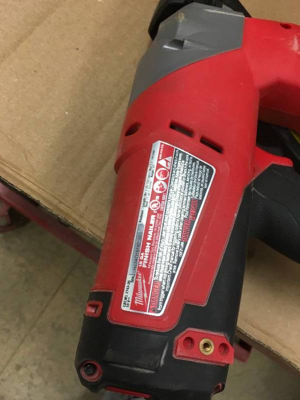 lot 63 image: Milwaukee M18 FUEL 18-Volt Lithium-Ion Brushless Cordless 15-Gauge Angled Finish Nailer (Tool Only) used in working condition