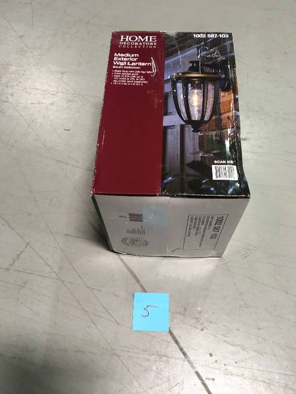 lot 5 image: Home Decorators 1-Light Black with Gold Highlights Outdoor 8 in. Wall Mount Lantern with Clear Seedy Glass not used