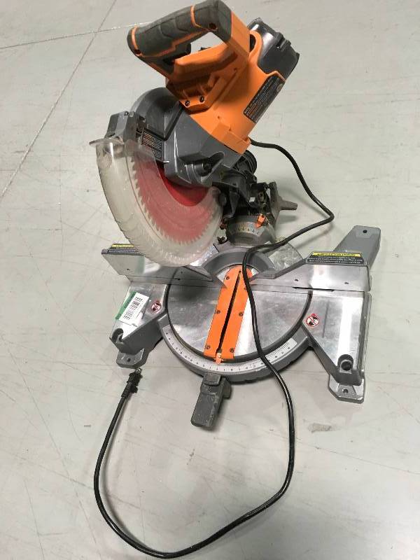 lot 6 image: Ridgid 15 Amp 10 in. Dual Bevel Miter Saw In very good working condition