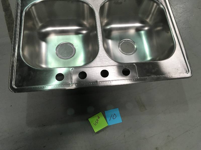 lot 10 image: Drop-In Stainless Steel 33 in. 4-Hole Double Bowl Kitchen Sink  USED in good conditions