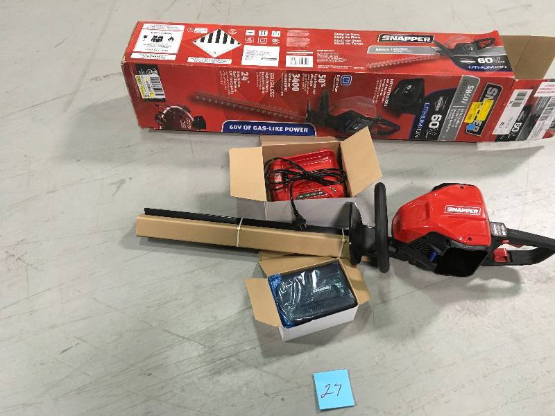 lot 27 image: SNAPPER 60-Volt Max Lithium-Ion Cordless Hedge Trimmer in working conditions