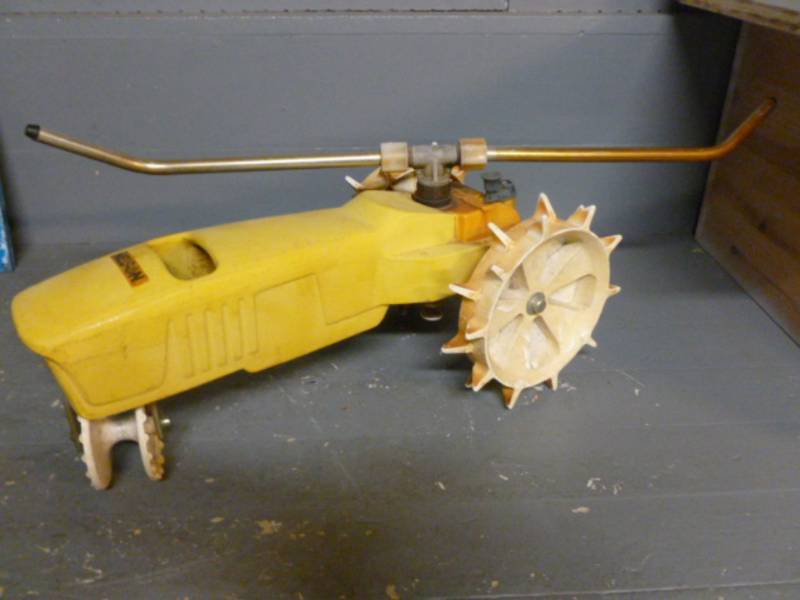 lot 14 image: Cast Iron Tractor Sprinkler