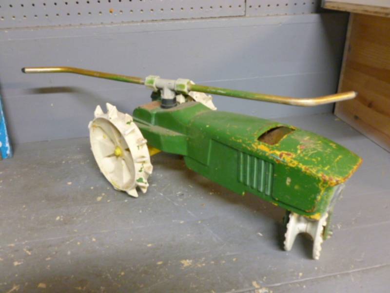 lot 15 image: John Deere Tractor Sprinkler