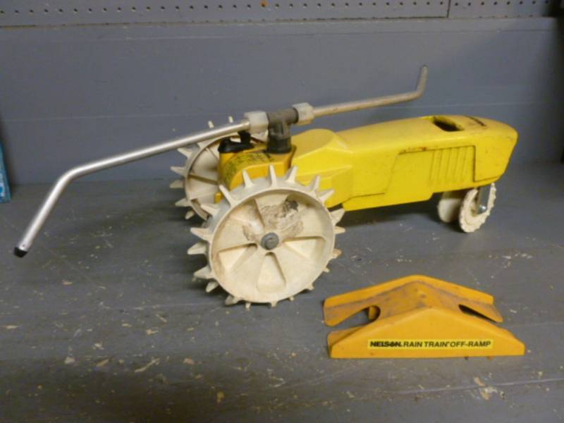 lot 16 image: Cast Iron Tractor Sprinkler