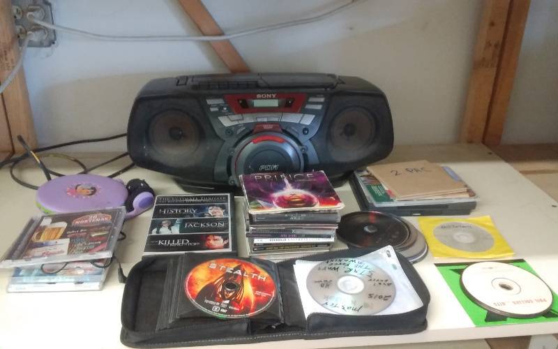 lot 5 image: Sony Boom Box, Assorted CDs, Some DVDs