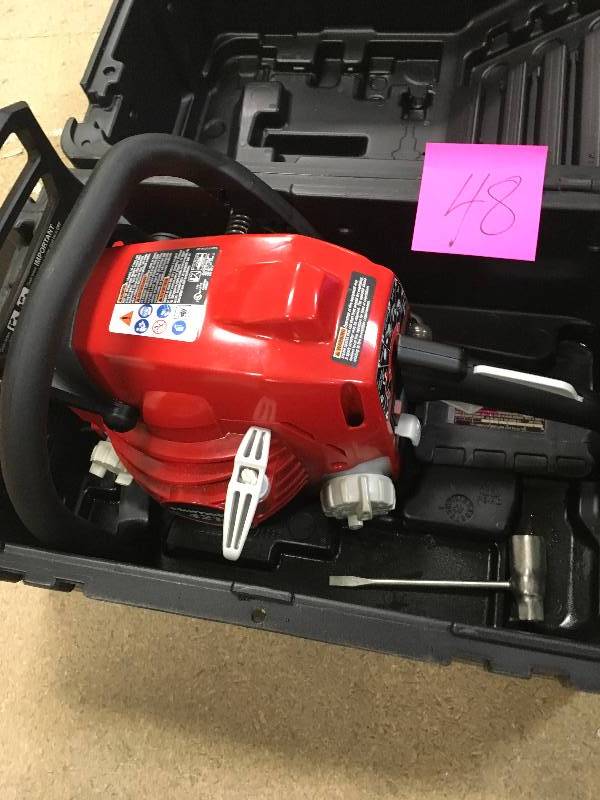 Homelite 16 in. 42cc Gas Chainsaw used in working conditions