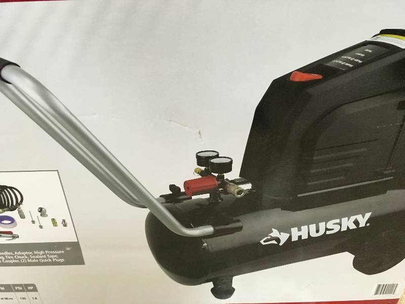 Husky 8 Gal. Portable Oil Free Electric Air Compressor in working conditions