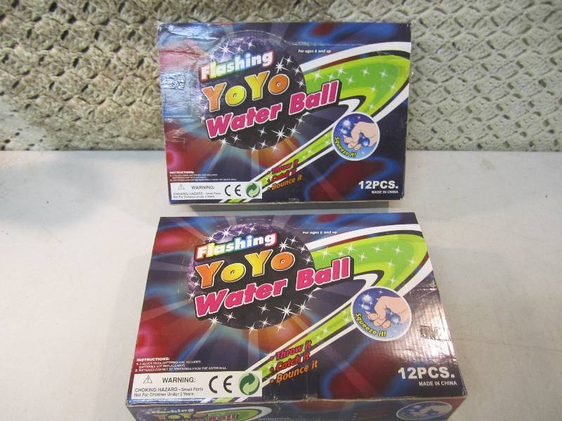lot 244 image: Lot of 24 Yo Yo Water Balls 2 boxes...
