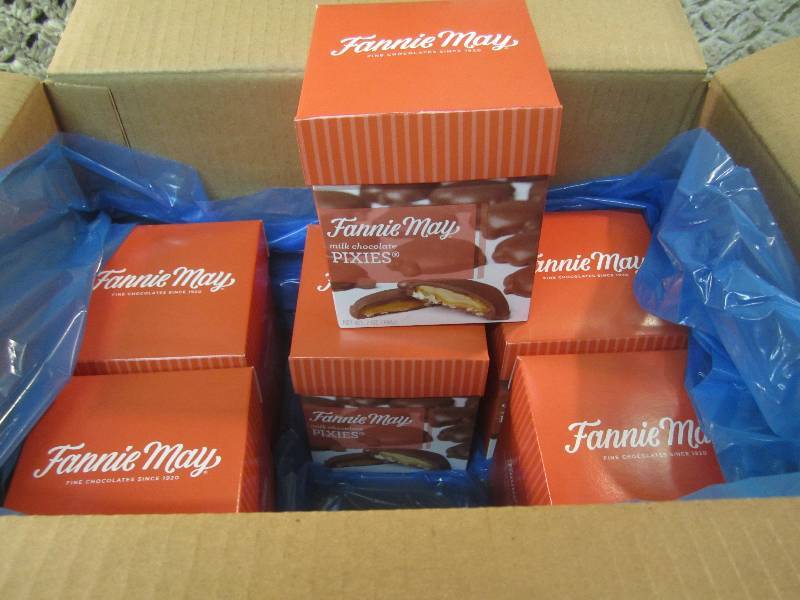 lot 253 image: Case of 6 Boxes of Fannie May Milk ...