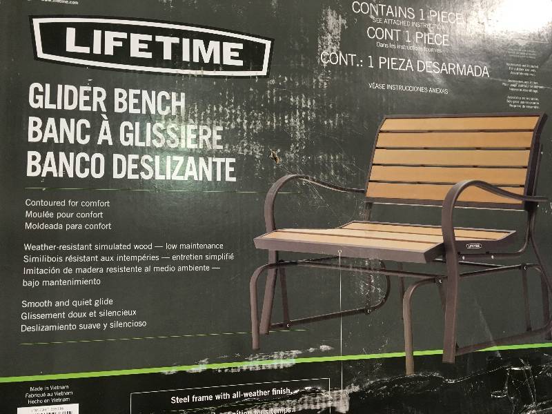 lot 72 image: Wood Alternative Patio Glider Bench in good conditions