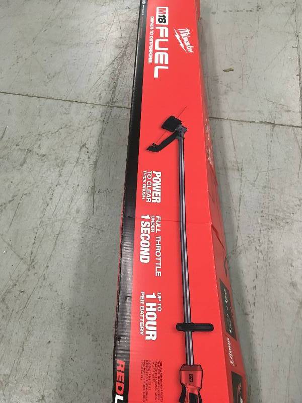 lot 77 image: MILWAUKEE M18 FUEL 18-Volt Lithium-ion Brushless Cordless String Trimmer Kit with 9.0Ah Battery and Rapid Charger in working conditions