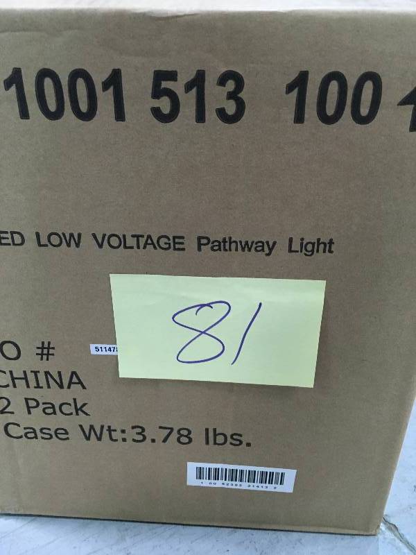 lot 81 image: Hampton Bay Low-Voltage Black Outdoor Integrated LED Black Landscape Path Light with White Tulip Shade 2 Pack  not used