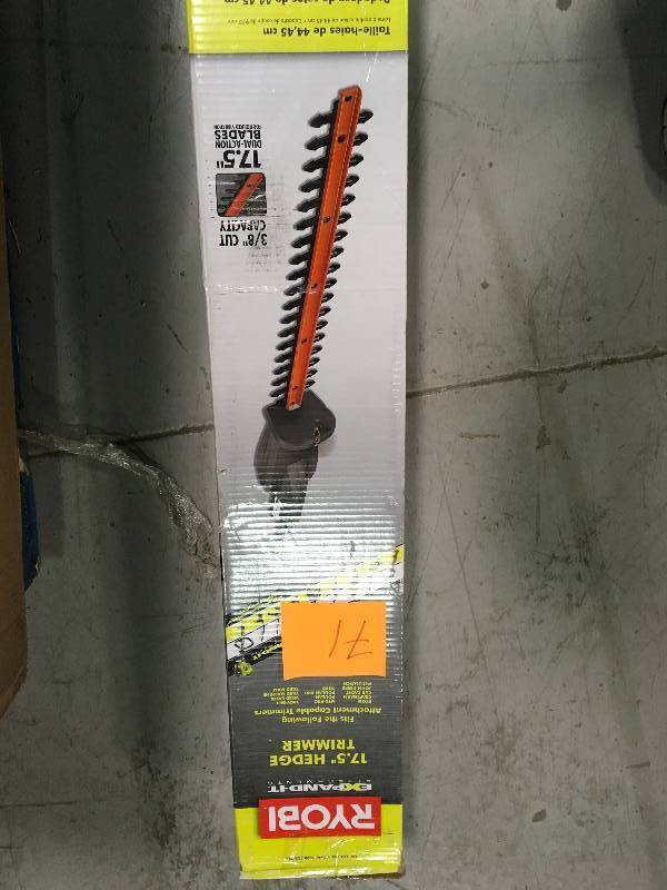 Ryobi Expand-It 17-12 in. Universal Hedge Trimmer Attachment in working conditions