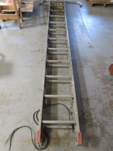 lot 104 image: 24 FOOT EXTENSION LADDER WITH BRACE
