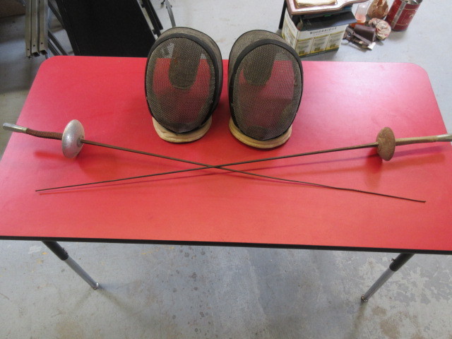 lot 130 image: FENCING MASKS AND EPEES