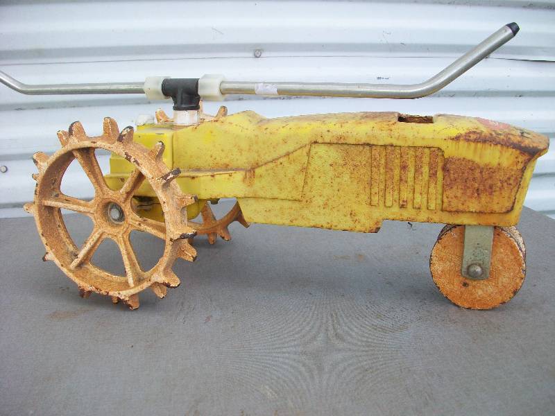 lot 54 image: Tractor Sprinkler