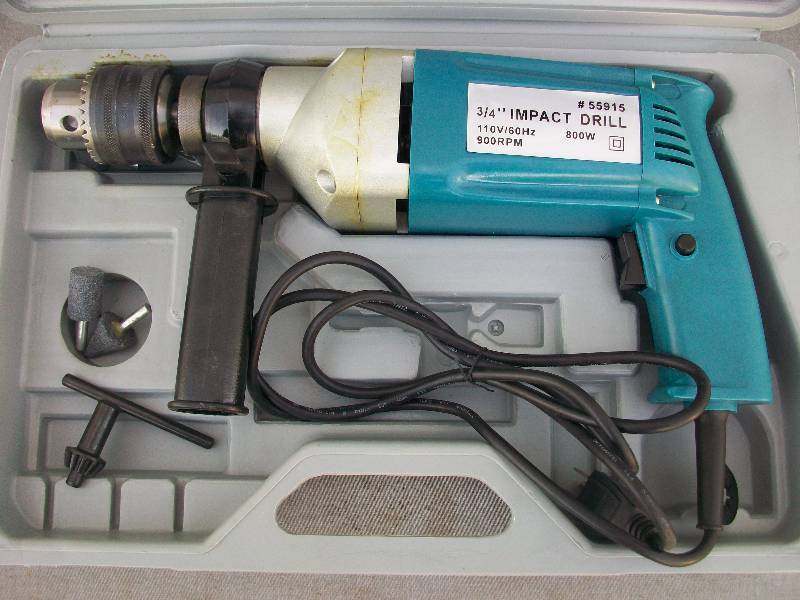 lot 77 image: 34 Impact Drill