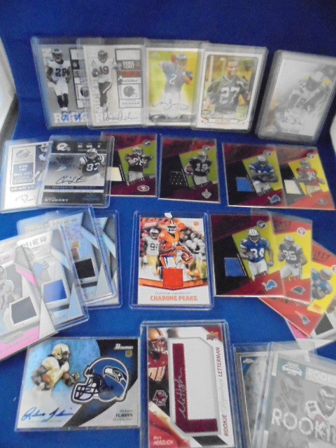 lot 65 image: Rookie NFL Jersey Patch Cards and Autographed Patch Cards