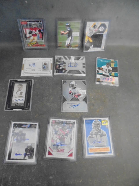 lot 72 image: Jimmy Garoppolo Chrome Card, Nick Foles, JuJu Smith Schuster Rookie Patch and 5 Autograph Jersey Cards