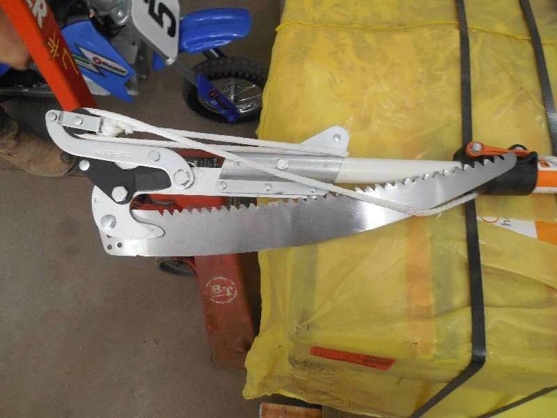 lot 70 image: Fiskars PowerLever 1-18 in. Cut Capacity Steel Saw Blade 15 in. Fiberglass Pole 14 ft. Tree Pruner