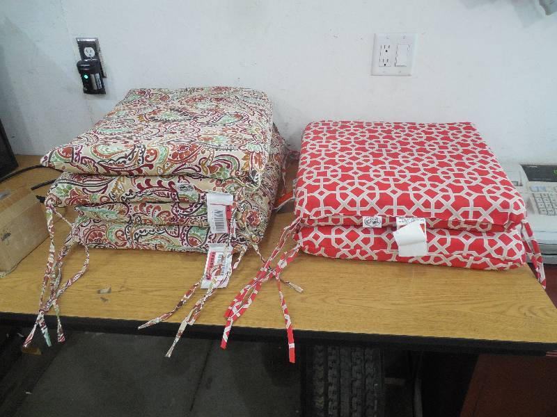 lot 77 image: (4) PATIO FURNITURE CUSHIONS