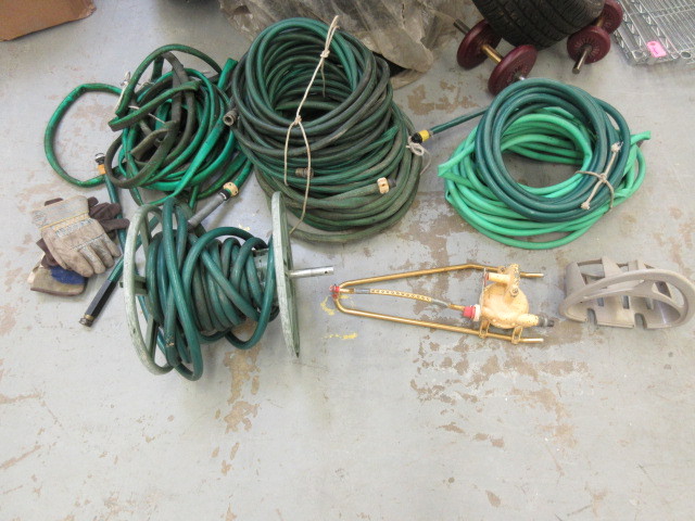 lot 238 image: GARDEN HOSE, SPRINKLER AND REELS