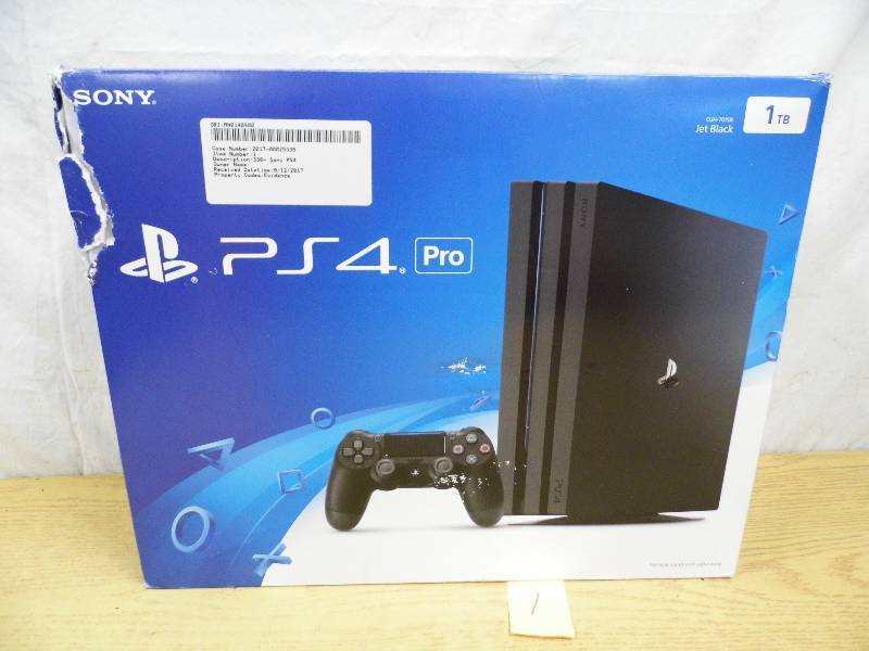 lot 1 image: PS4 Pro System