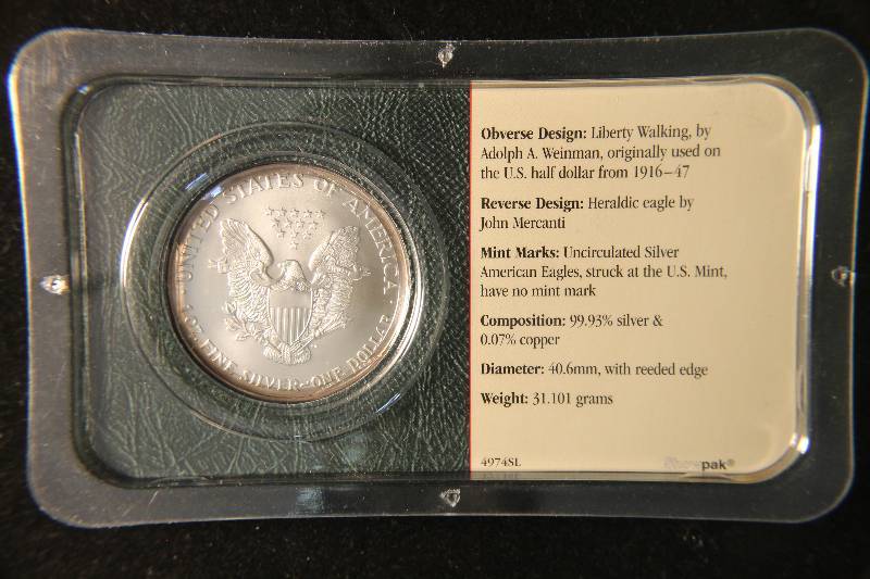 2002 AMERICAN SILVER EAGLE 1 TROY OZ. .999 FINE SILVER IN SEALED LITTLETON HOLDER