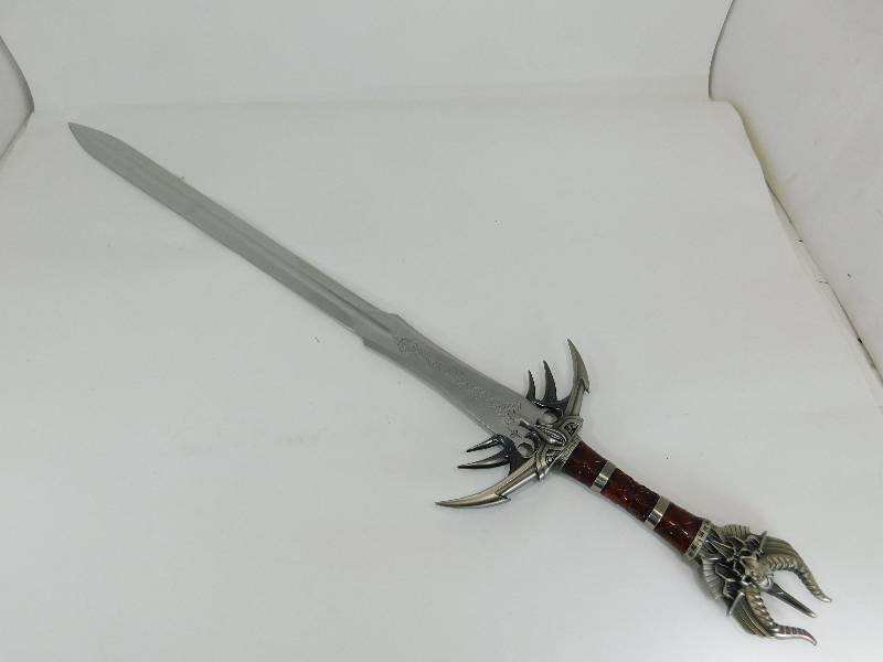 lot 10 image: KP0020 Stainless Steel Design 2004 UCC Sword