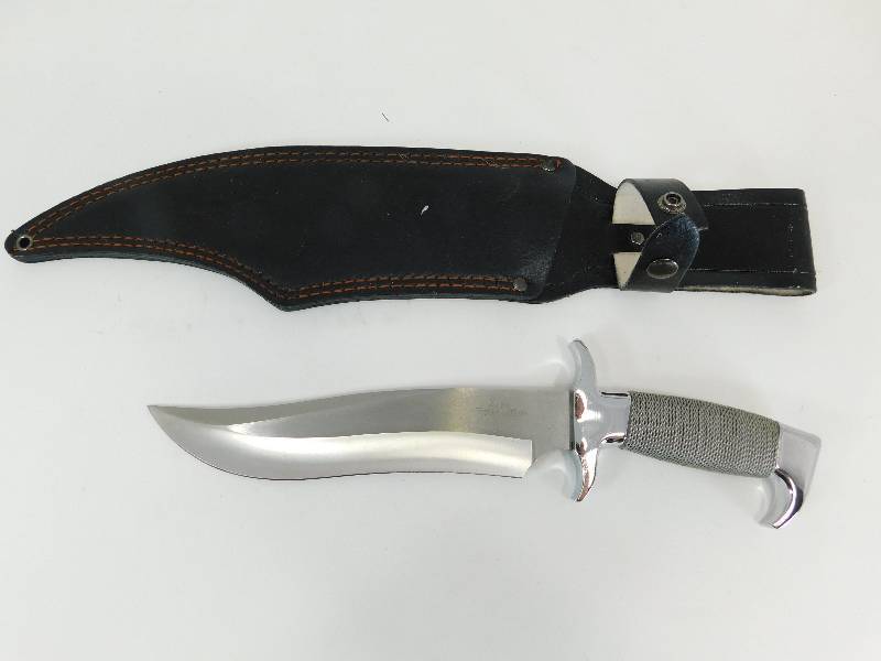 lot 11 image: Custom Design Hibben Knives Knife In Black Leather Case
