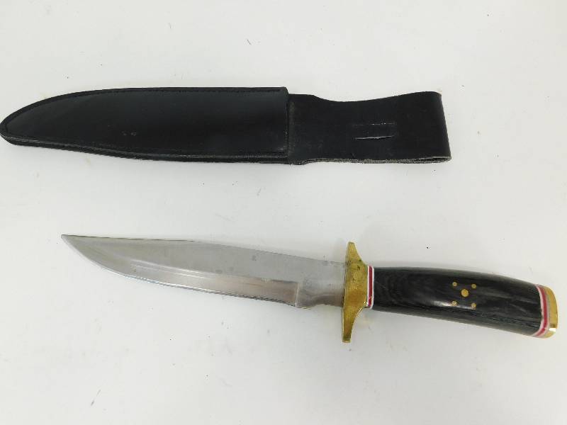lot 58 image: Knife In Black Leather Sheath