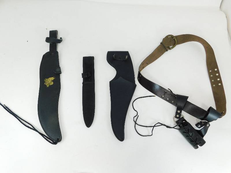 lot 67 image: Four Different Designs Of Leather Sheaths For Swords Or Sabres