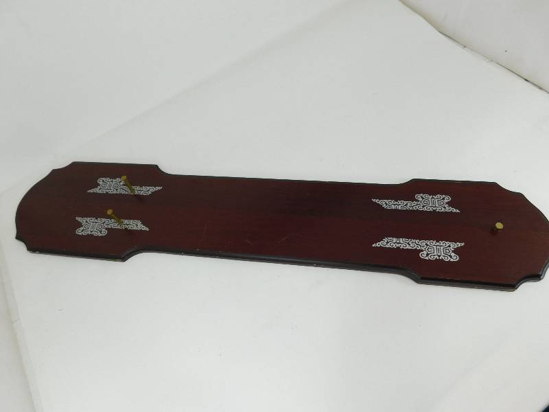 lot 70 image: Dark Brown Wooden Wall Display For A Sword Or Saber