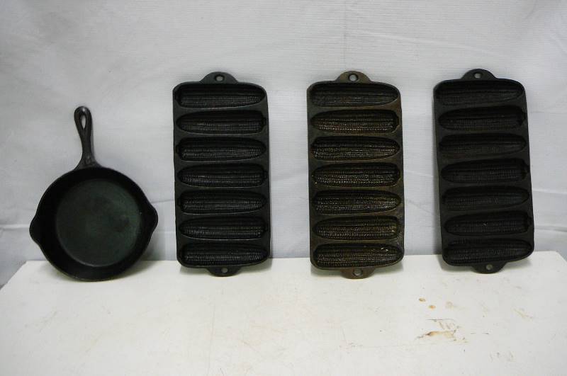 lot 15 image: Cast Iron Wagner Corn Muffin Pans & #5 Skillet