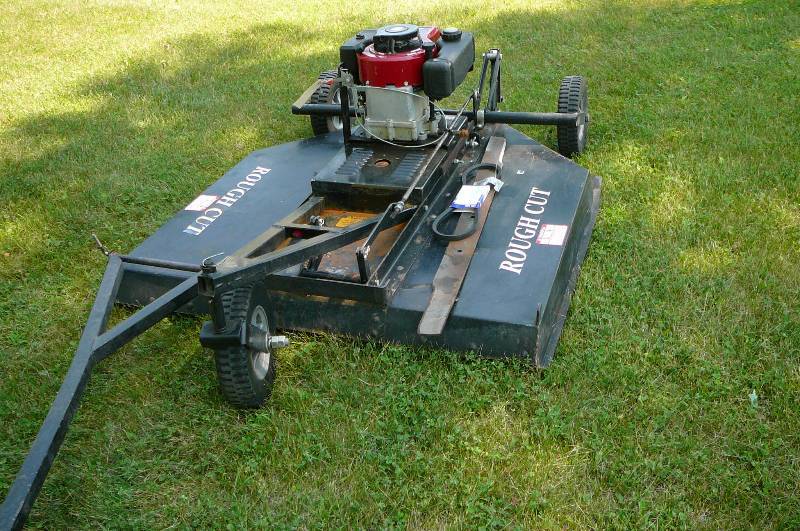 lot 31 image: Rough Cut Pull Behind Mower 48 Cut