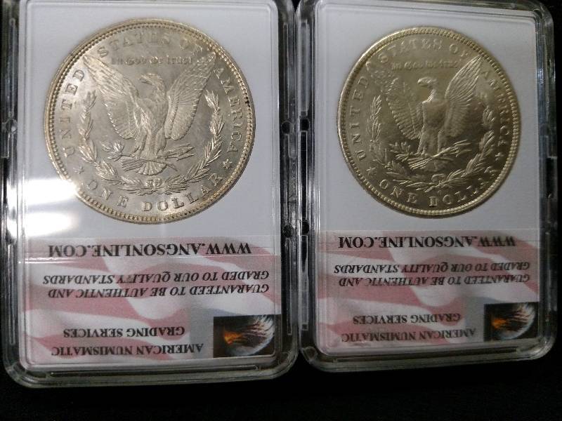 lot 7 image: 1882 O & 1896 ANGS MS66 Morgan Silv...