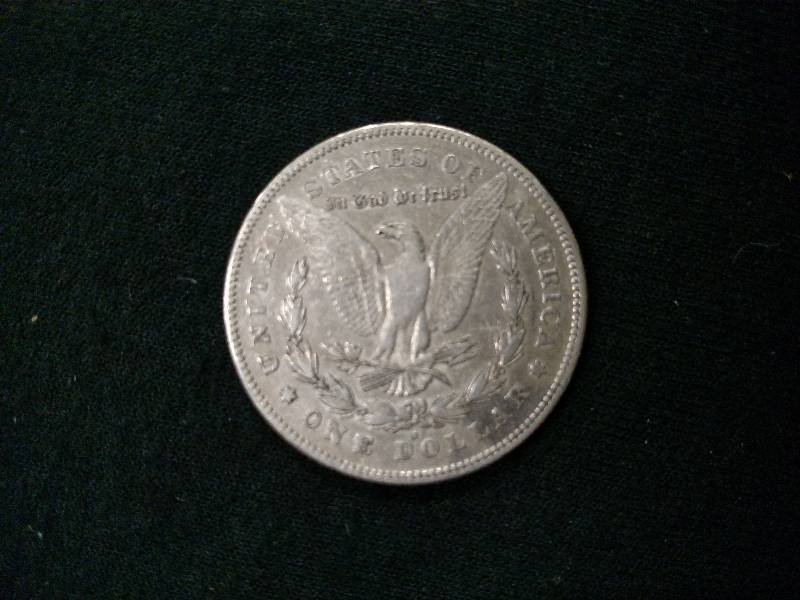 lot 9 image: 1878 S Morgan Silver Dollar...