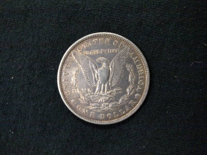 lot 10 image: 1882 Morgan Silver Dollar...