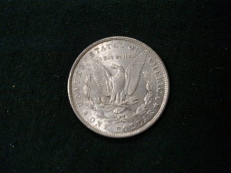 lot 14 image: 1886 Morgan Silver Dollar...