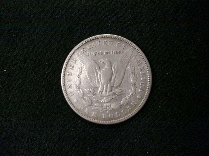 lot 19 image: 1899 S Morgan Silver Dollar...