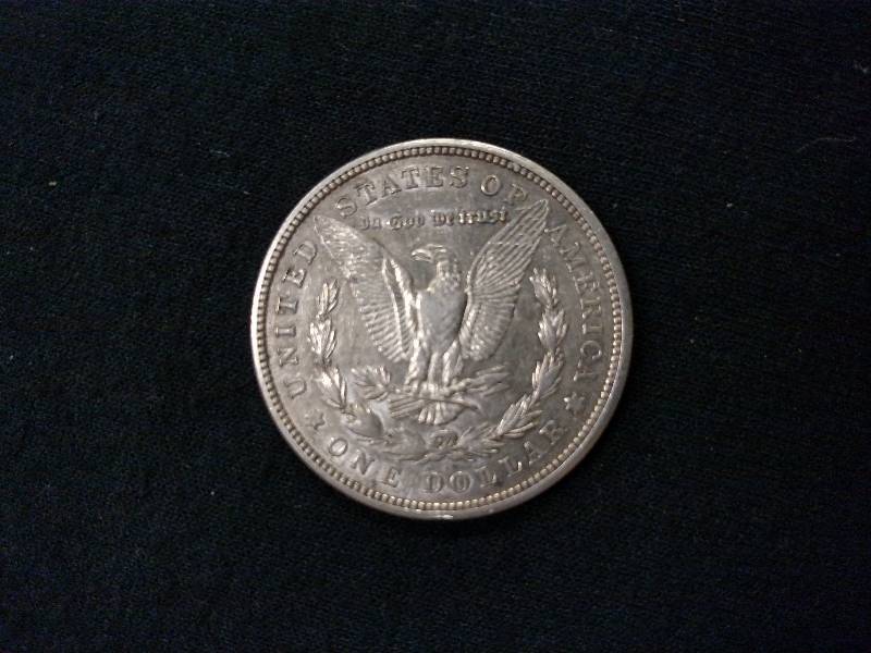lot 21 image: 1921 D Morgan Silver Dollar...