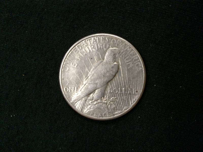 lot 23 image: 1922 S Peace Silver Dollar...