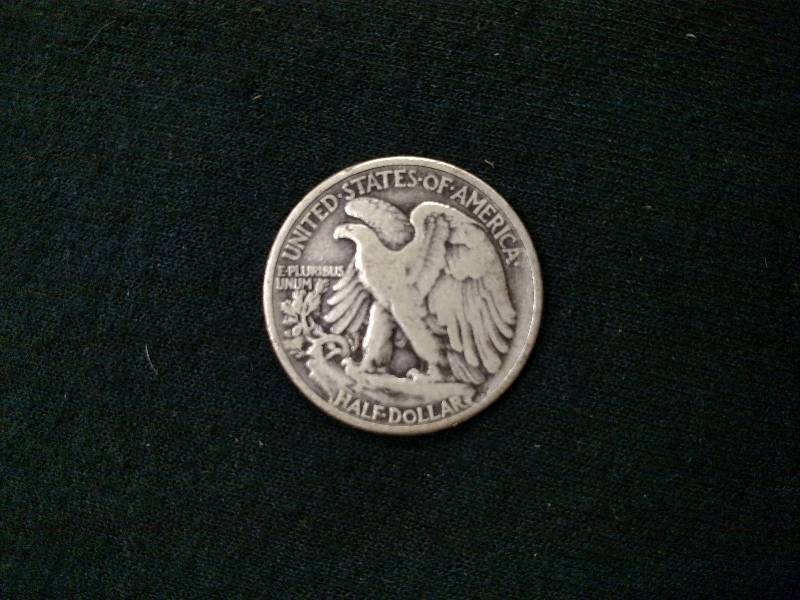lot 28 image: 1939 Walking Liberty Silver Half Do...